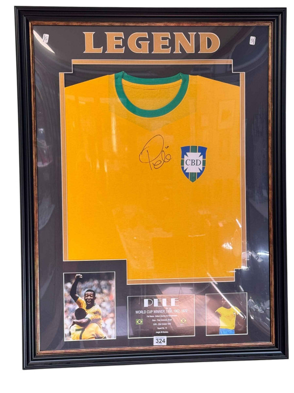Pele, signed Brazil National Team football shirt, two photographic prints and text, with COA, 84cm by 64cm, including frame.