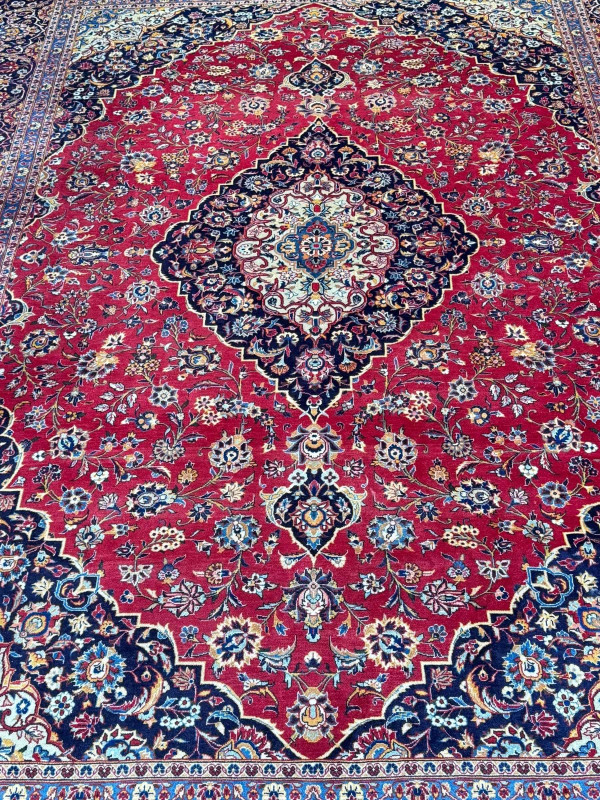 Iranian carpet with central medallion, 4.00 by 2.95.