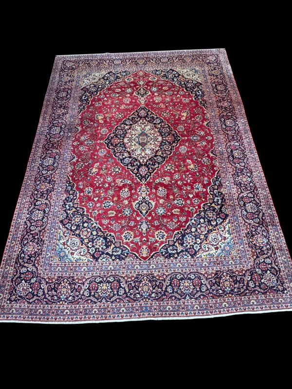 Iranian carpet with central medallion, 4.00 by 2.95.