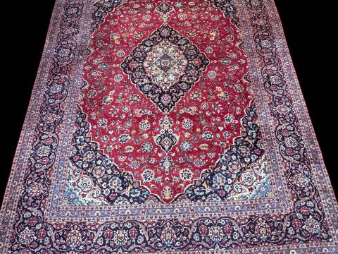 Iranian carpet with central medallion, 4.00 by 2.95.