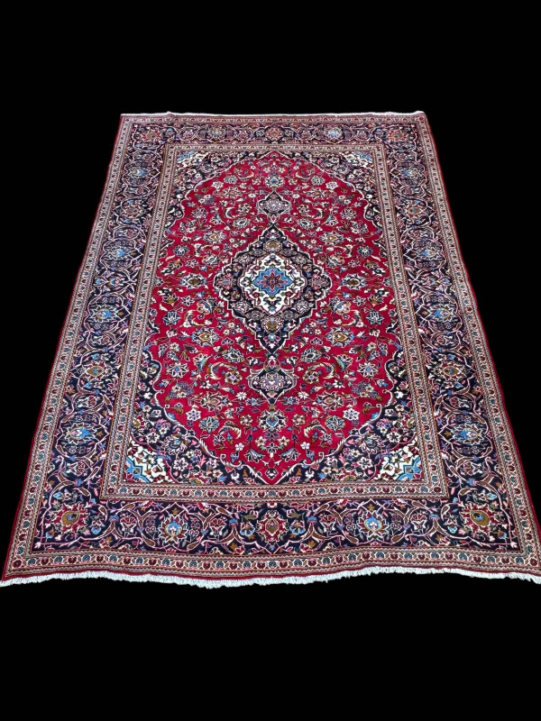 Persian floral decorated carpet with central medallion, 3.30 by 2.40.