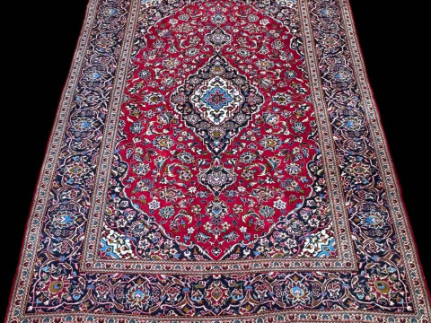 Persian floral decorated carpet with central medallion, 3.30 by 2.40.