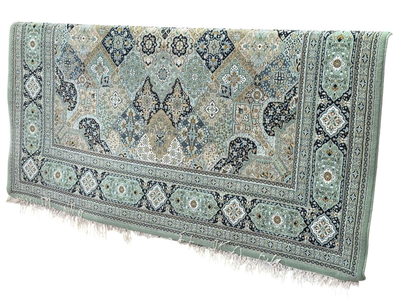 Green ground carpet with central medallion 3.80 by 2.50.