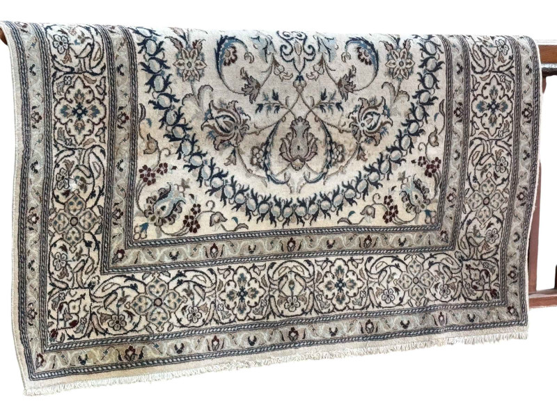 Iranian carpet with central medallion 2.96 by 1.98.