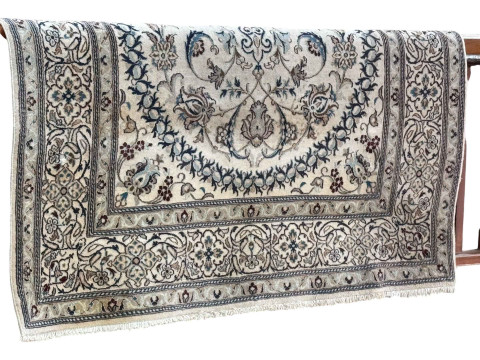 Iranian carpet with central medallion 2.96 by 1.98.