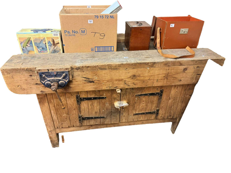 Storage work bench with opposing vices, 82cm by 153cm by 76cm.