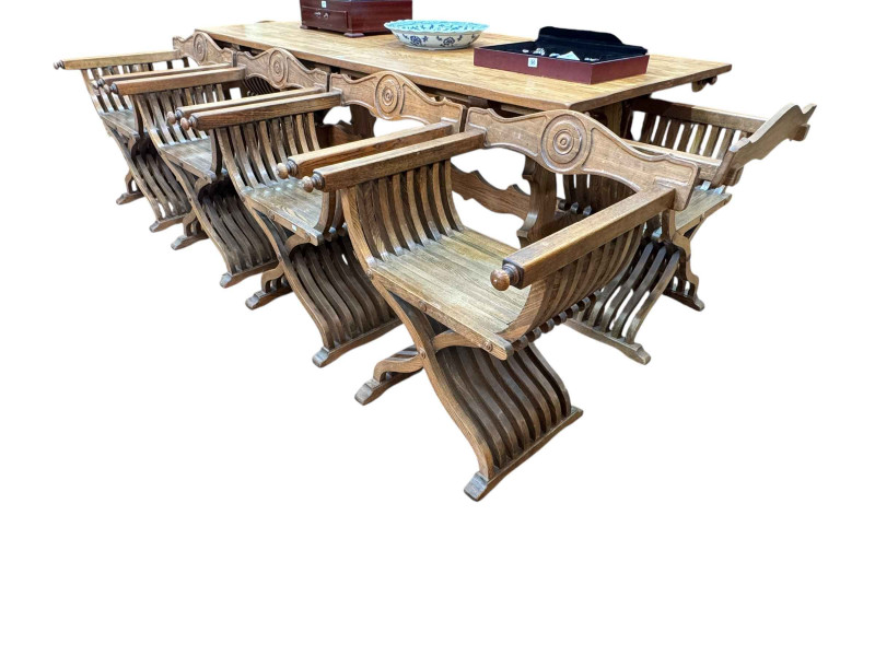 Rectangular oak table 76cm by 214cm by 101cm, and set of six X-framed chairs (table top not affixed).