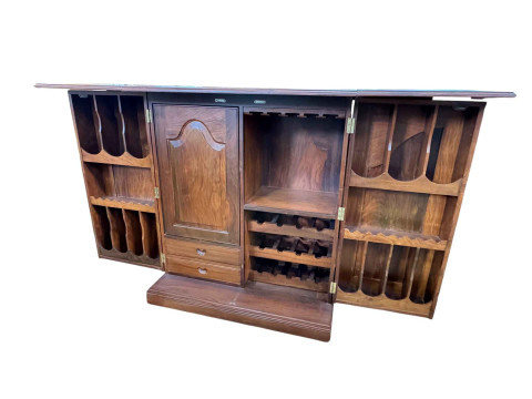 Eastern carved hardwood and brass inlaid cocktail cabinet, the double hinged lid above two doors enclosing a well fitted interior, 117cm by 99cm by 54cm. thumbnail