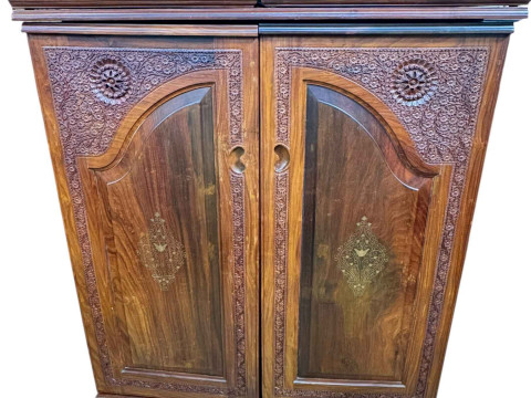 Eastern carved hardwood and brass inlaid cocktail cabinet, the double...