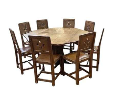 Albert 'Eagleman' Jeffray octagonal adzed oak dining table, 74cm by 144cm, and set of eight Yorkshire Rose panel back dining chairs. thumbnail