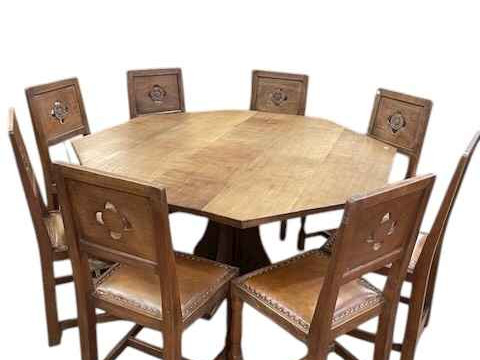 Albert 'Eagleman' Jeffray octagonal adzed oak dining table, 74cm by 144cm, and set of eight Yorkshire Rose panel back dining chairs. thumbnail