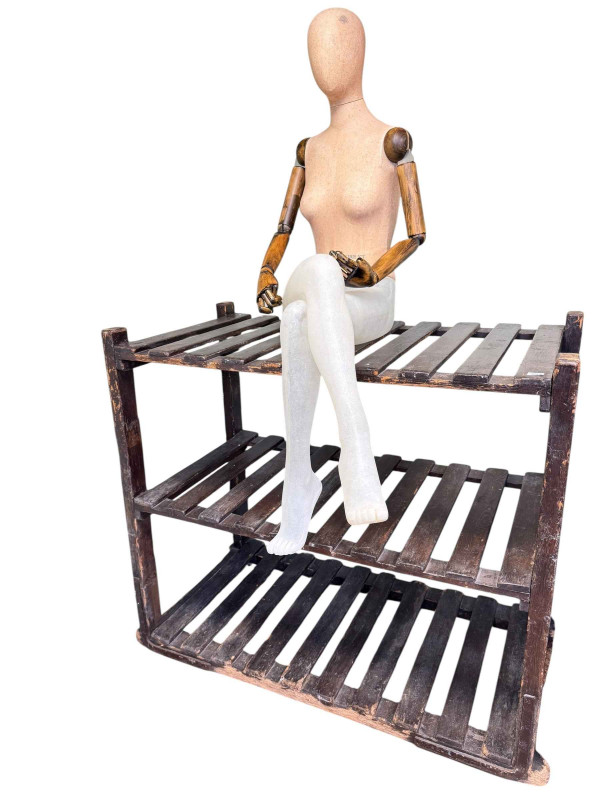 Jack Wills female mannequin with some damaged areas and associated three tier stand.