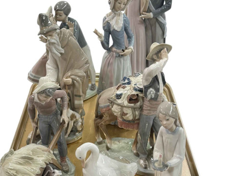 Collection of Lladro figurines including Typical Peddler and Gardener...
