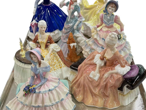 Seven Royal Doulton figurines including Reverie, Meditation and Daydreams.
