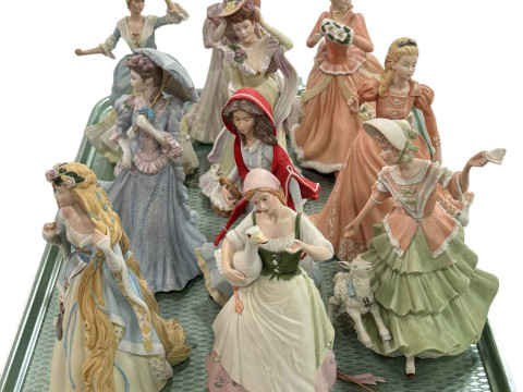 Ten Wedgwood figurines including Rapunzel, Red Riding Hood, Mary had a...