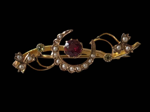 Seed pearl, ruby and peridot set 9 carat gold brooch, cased.