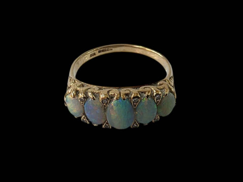 Opal five stone 18 carat gold ring with tiny diamonds, size S.