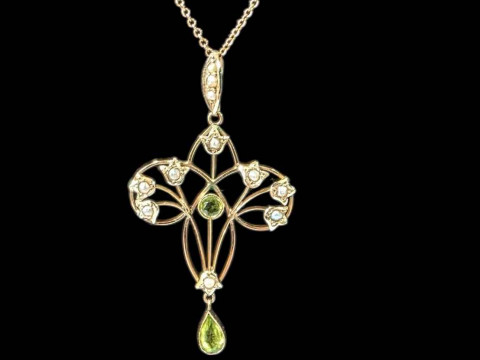 9 carat gold peridot and seed pearl set pendant and chain, together with...