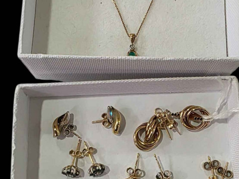 Six pairs of gold earrings, cameo brooch, and pendant and earrings set.