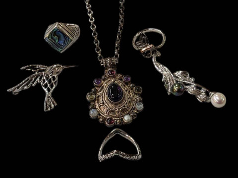 Small collection of silver jewellery including Clogau ring.