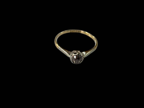 Diamond solitaire 18 carat gold ring, size P.