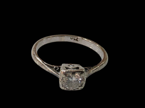 Diamond solitaire 18 carat white gold ring, size M.