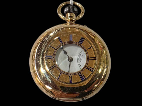 18 carat gold gents half hunter keyless pocket watch.