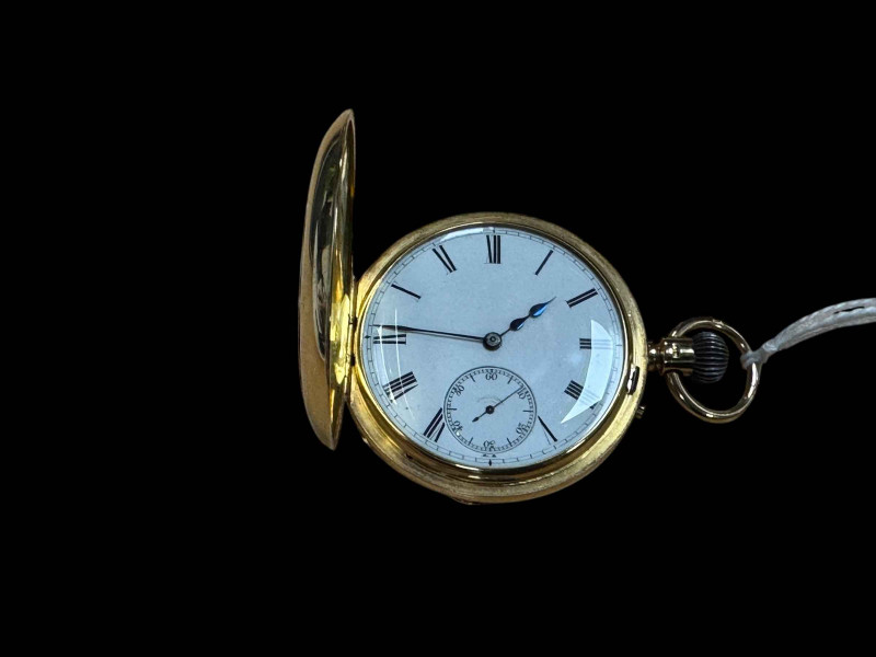 18 carat gold gents half hunter keyless pocket watch.