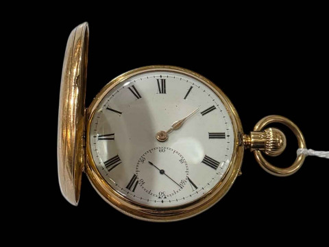 18 carat gold gents half hunter keyless pocket watch.