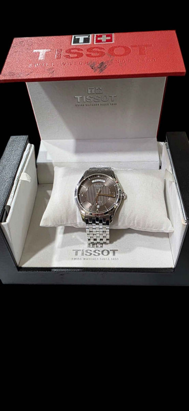 Tissot automatic day date gents wristwatch, with box and papers.