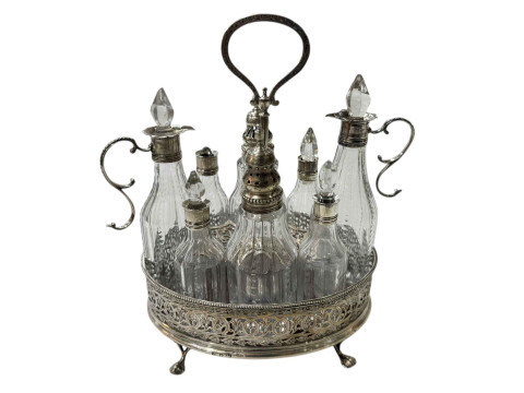 George III silver eight bottle cruet with pierced and engraved gallery,...