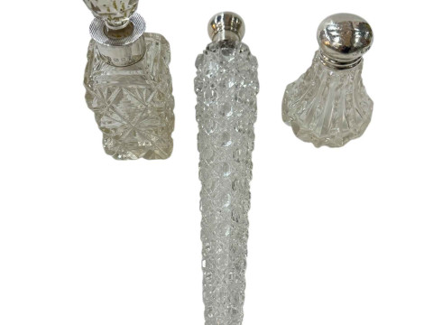 Large silver topped crystal scent bottle, London 1884, and two others...