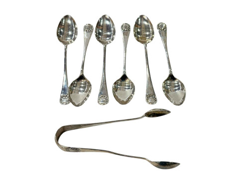 Set of six silver shell handle teaspoons with tongs, Birmingham 1927.