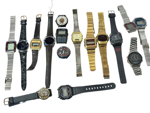 Collection of digital wristwatches including Casio, Swatch, Sanyo, etc.