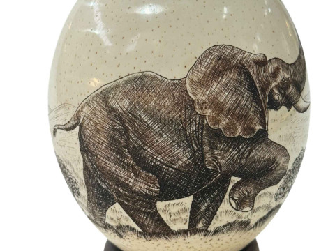 Ostrich egg with elephant signed by artist NDABA.