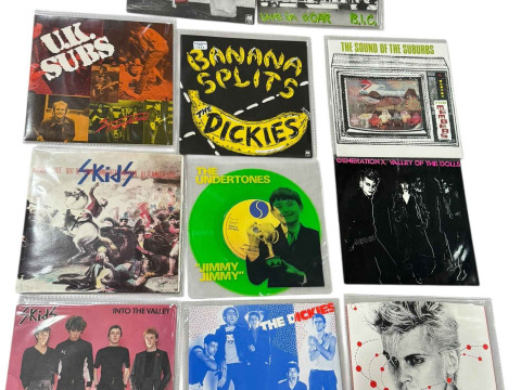 Collection of eleven 45rpm coloured vinyls.