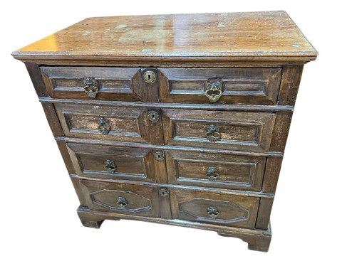 Antique oak Jacobean style chest of four drawers raised on bracket feet,...