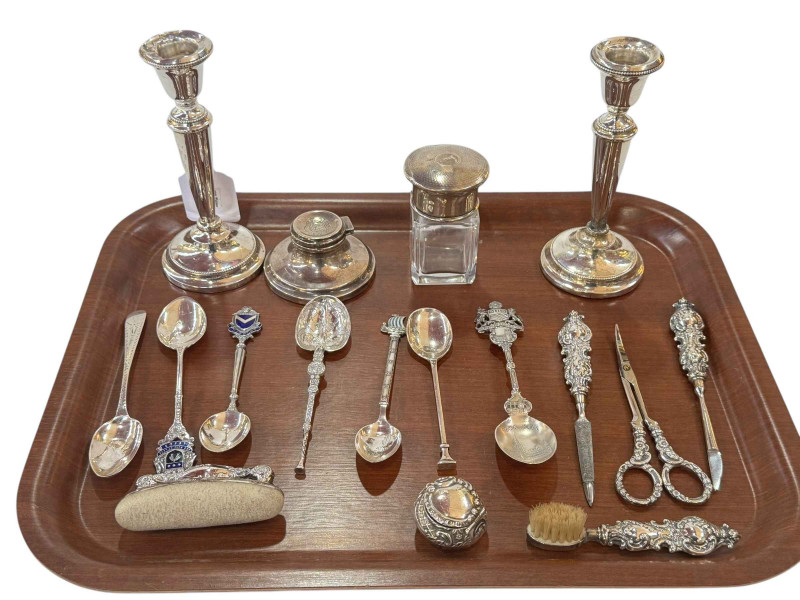 Collection of silver including a pair of candlesticks, inkwell, spoons, etc.