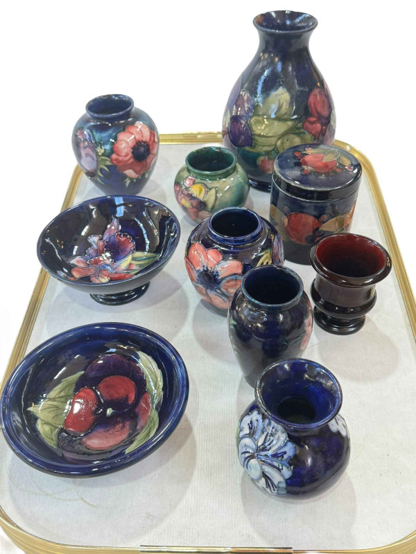 Collection of Moorcroft including bowls and vases.