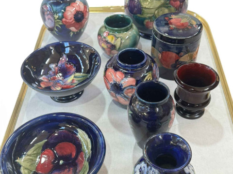 Collection of Moorcroft including bowls and vases.