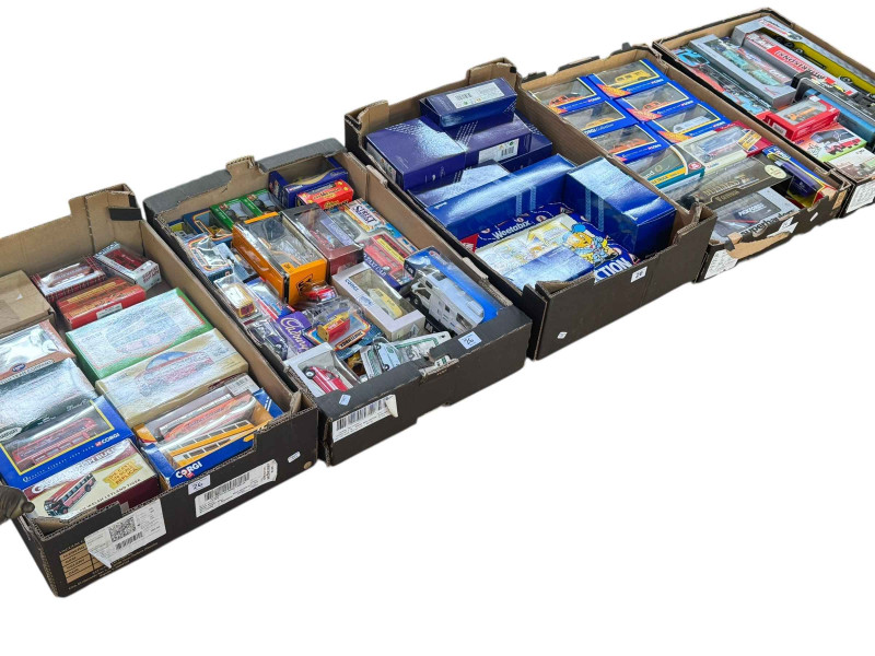 Five boxes of diecast models including Corgi trams, buses, Weetabix Special Edition, Matchbox, etc.