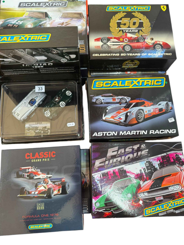 Collection of Trade Pack Scalextric including Formula One 1976, Fast and Furious, Aston Martin Racing, etc.