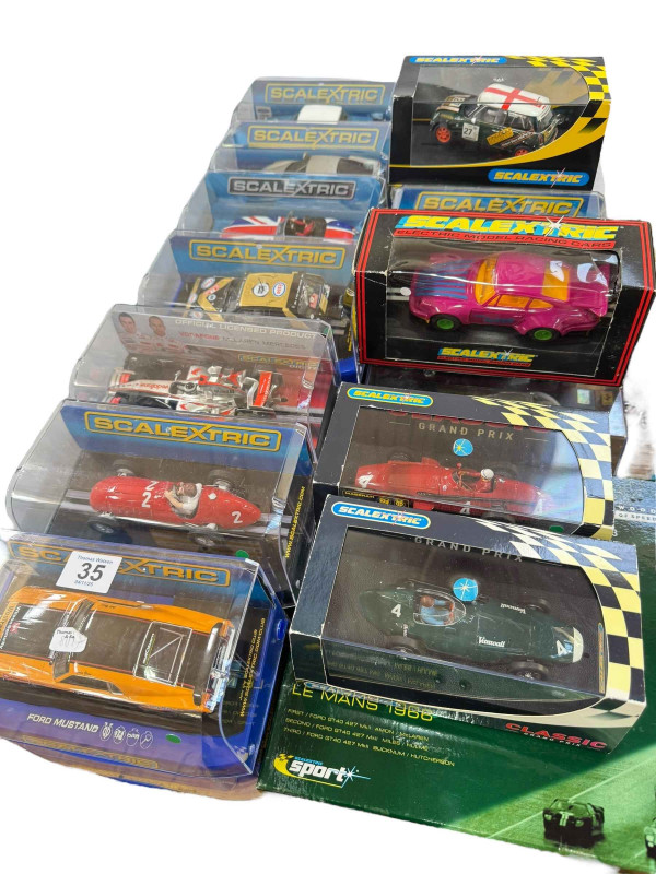 Collection of diecast Scalextric models including limited edition Le Mans 1966, Formula One, Classic Grand Prix, etc.