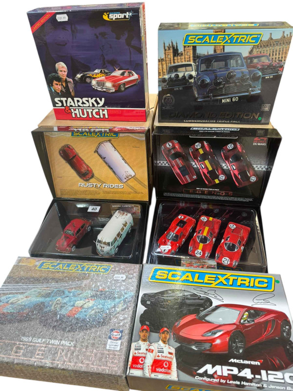 Collection of Trade Pack Scalextric including 1967 Le Mans, Starsky and Hutch, McLaren MP4-12C, etc.