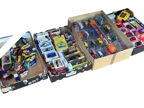 Four boxes of diecast model vehicles including Corgi, Matchbox, etc.