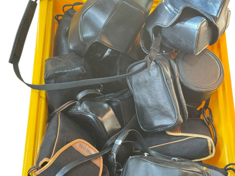 Box of cameras including Olympus Digital, Richoh, Minolta, etc.