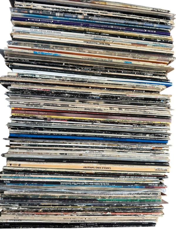 Four boxes of LP records.