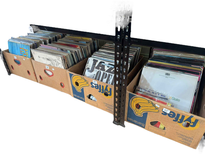 Four boxes of LP records.