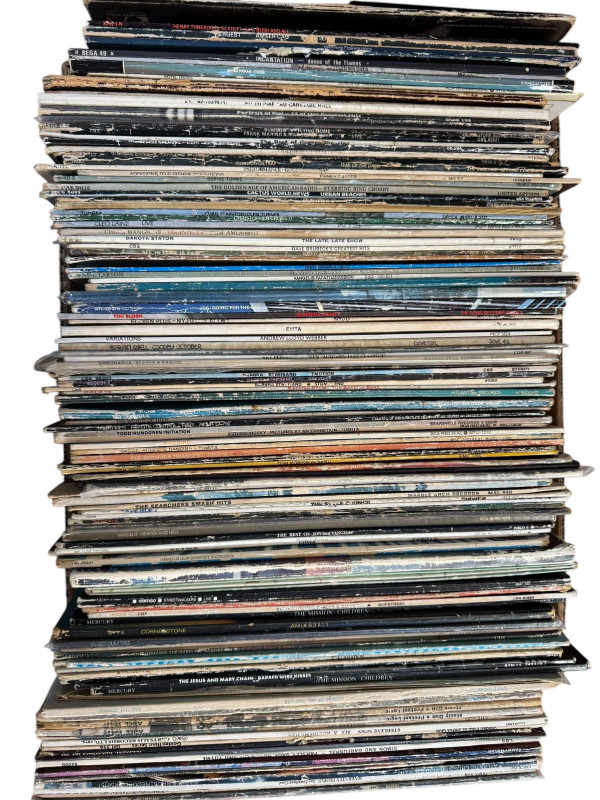 Four boxes of LP records.