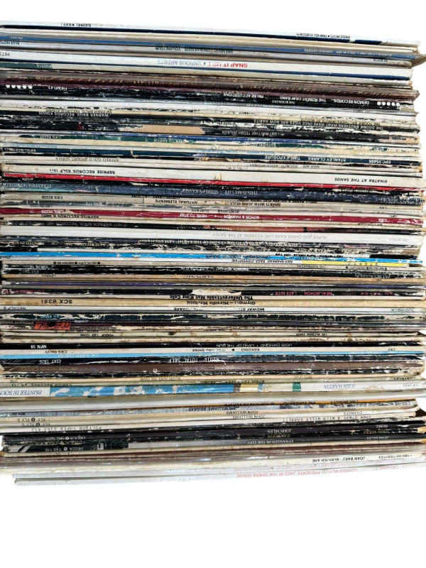 Four boxes of LP records.